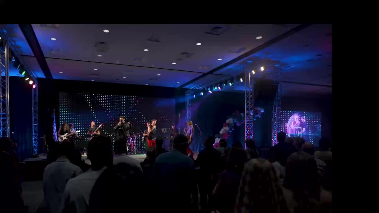 Packed dance floor at a live band show