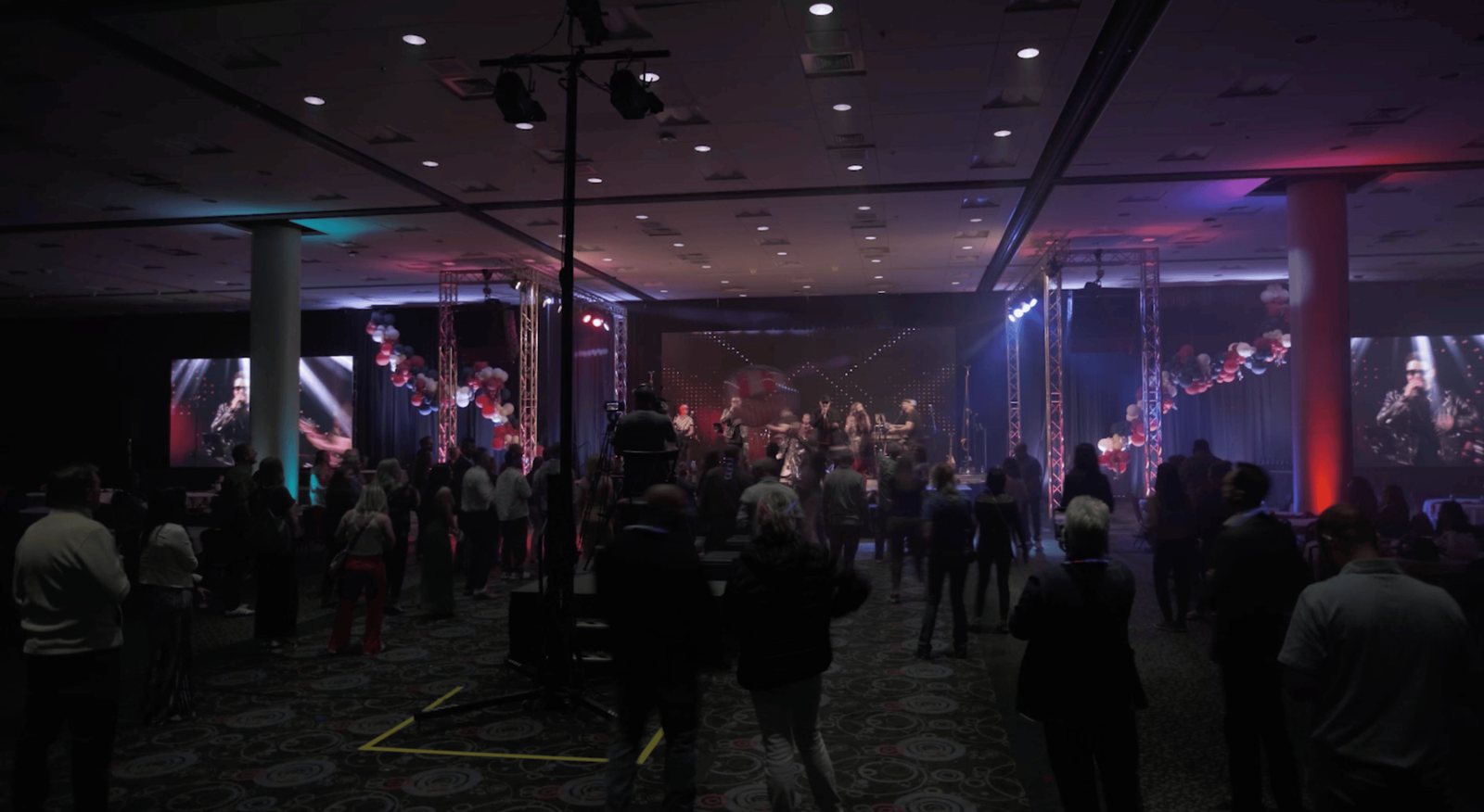 Attendees on their feet during the concert-grade band night