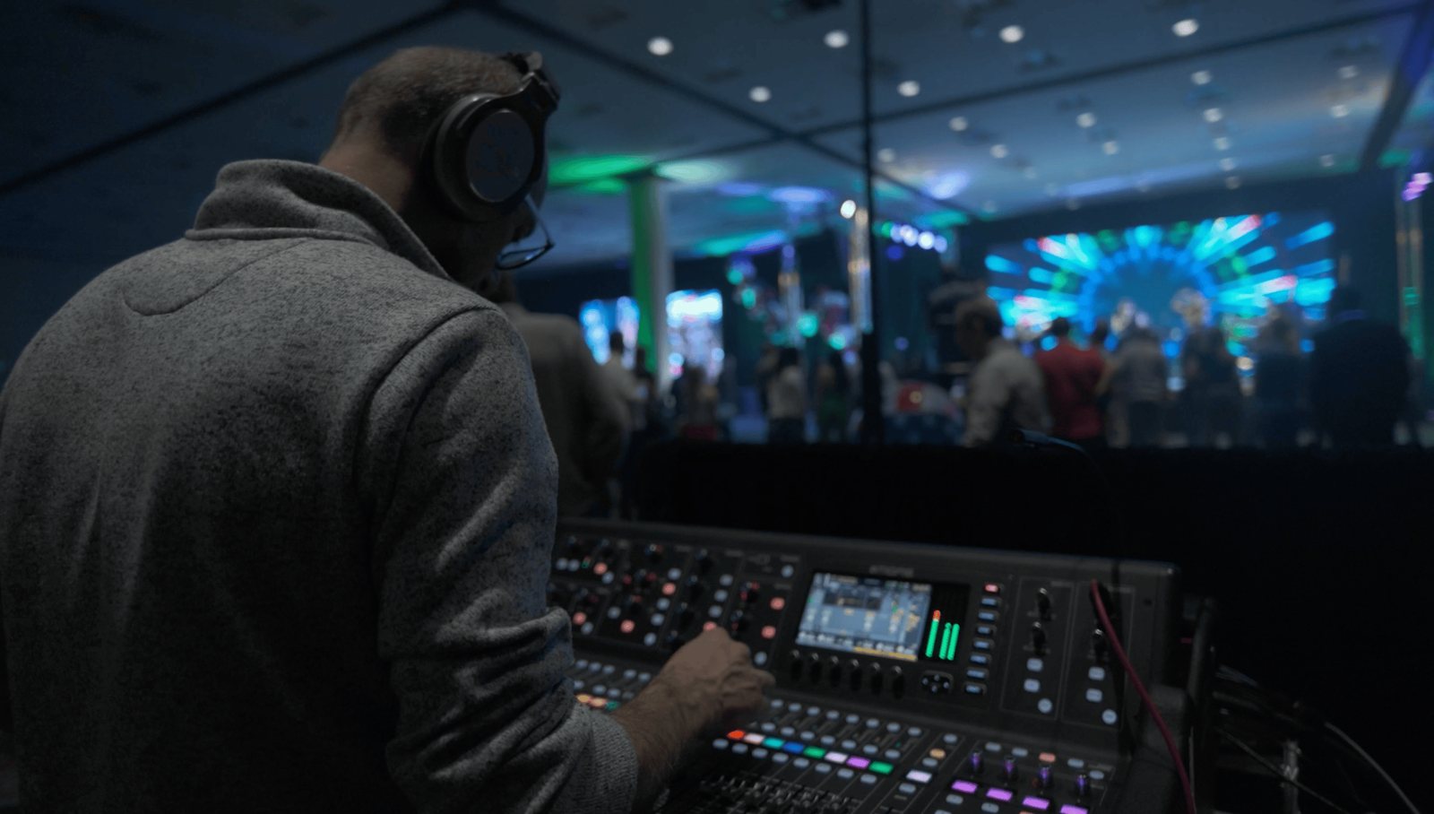 A True AV engineer at the front-of-house control position