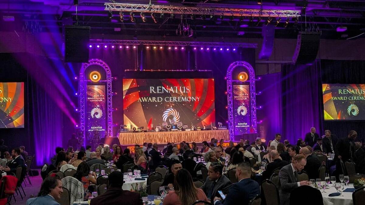 Renatus award gala in full swing, a packed room of guests at dinner tables