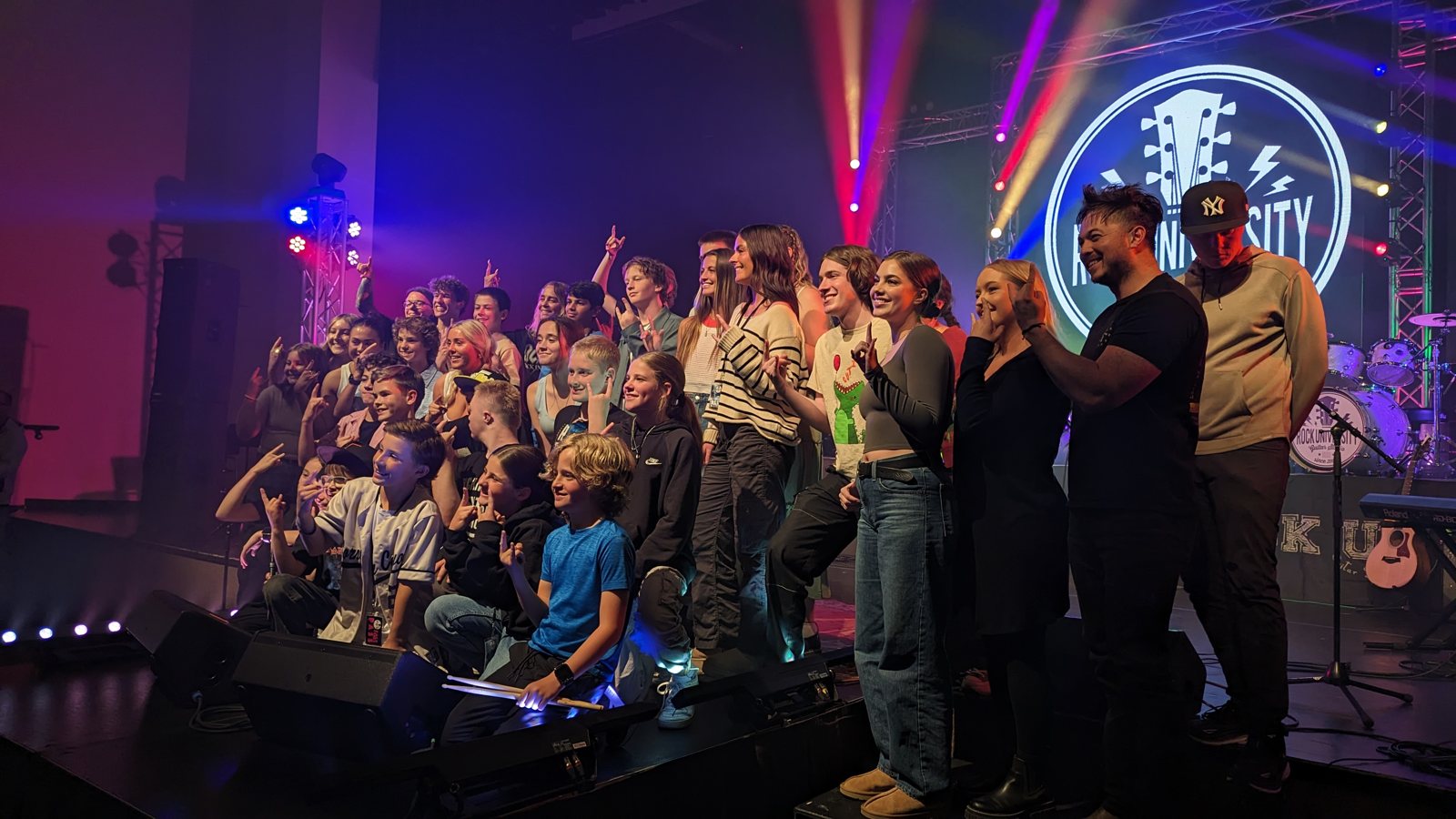Students and families celebrating together at Rock U Live