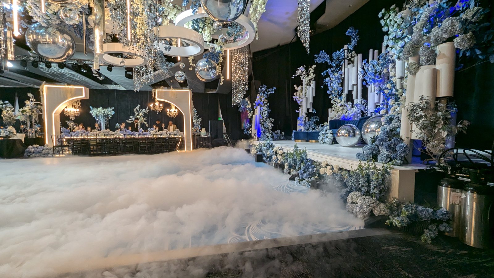 A wedding first dance on a cloud of low fog