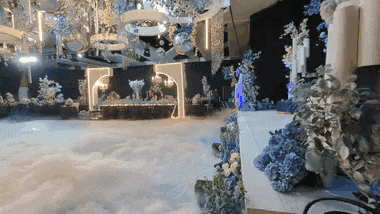 A dry-ice cloud rolling across a wedding dance floor