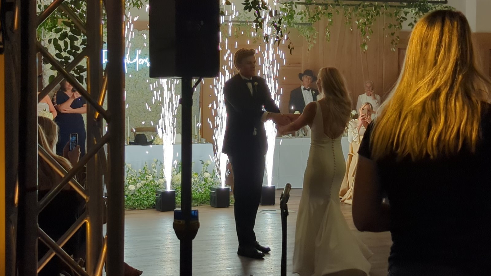 A first dance framed by cold-spark fountains