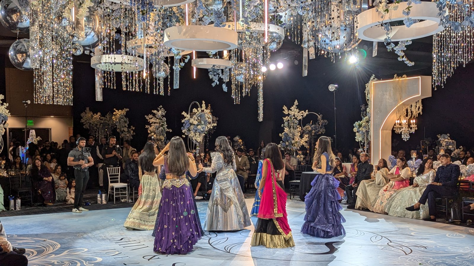 A cultural dance performance on the reception floor